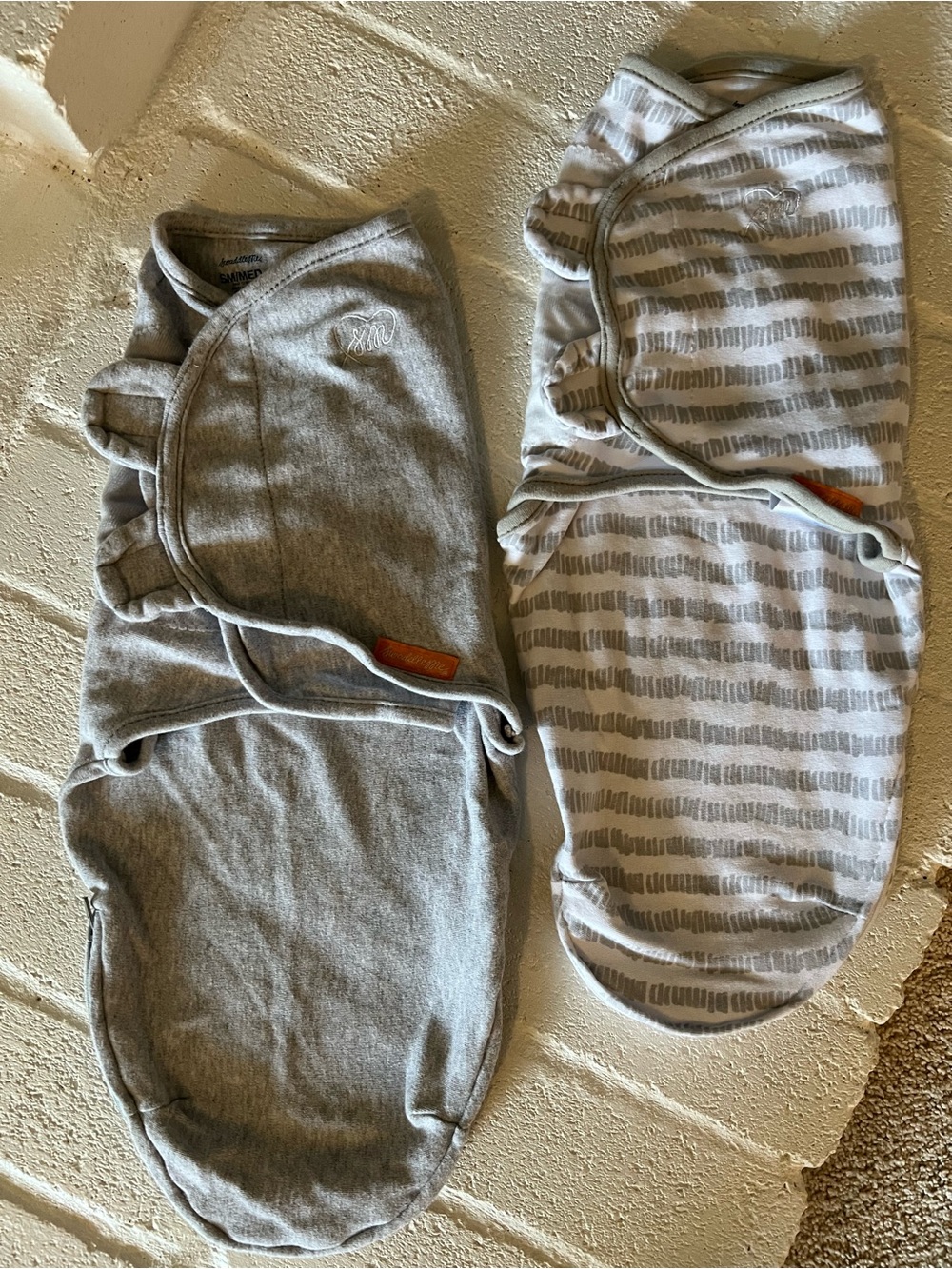 2 SwaddleMe Swaddles